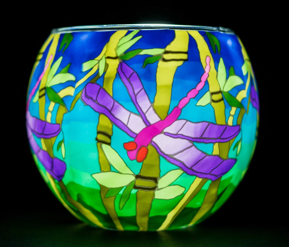 Dragonfly Claymaster light globe glowing from within, showing purple dragonflies and bamboo over a blue-to-green gradient