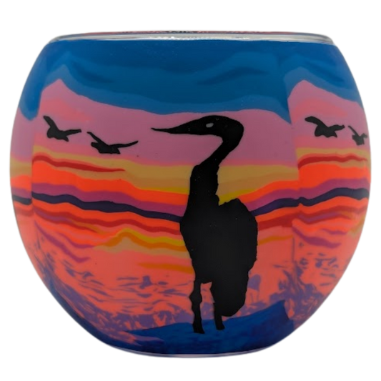 Heron Sunset Claymaster light globe with a black heron silhouette against layered pink, coral, orange and violet sunset bands