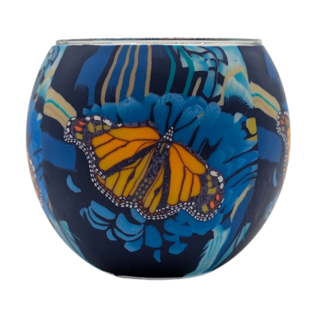 Monarch Butterfly Claymaster light globe with hand-wrapped orange-and-black monarch on a swirling blue and cream background