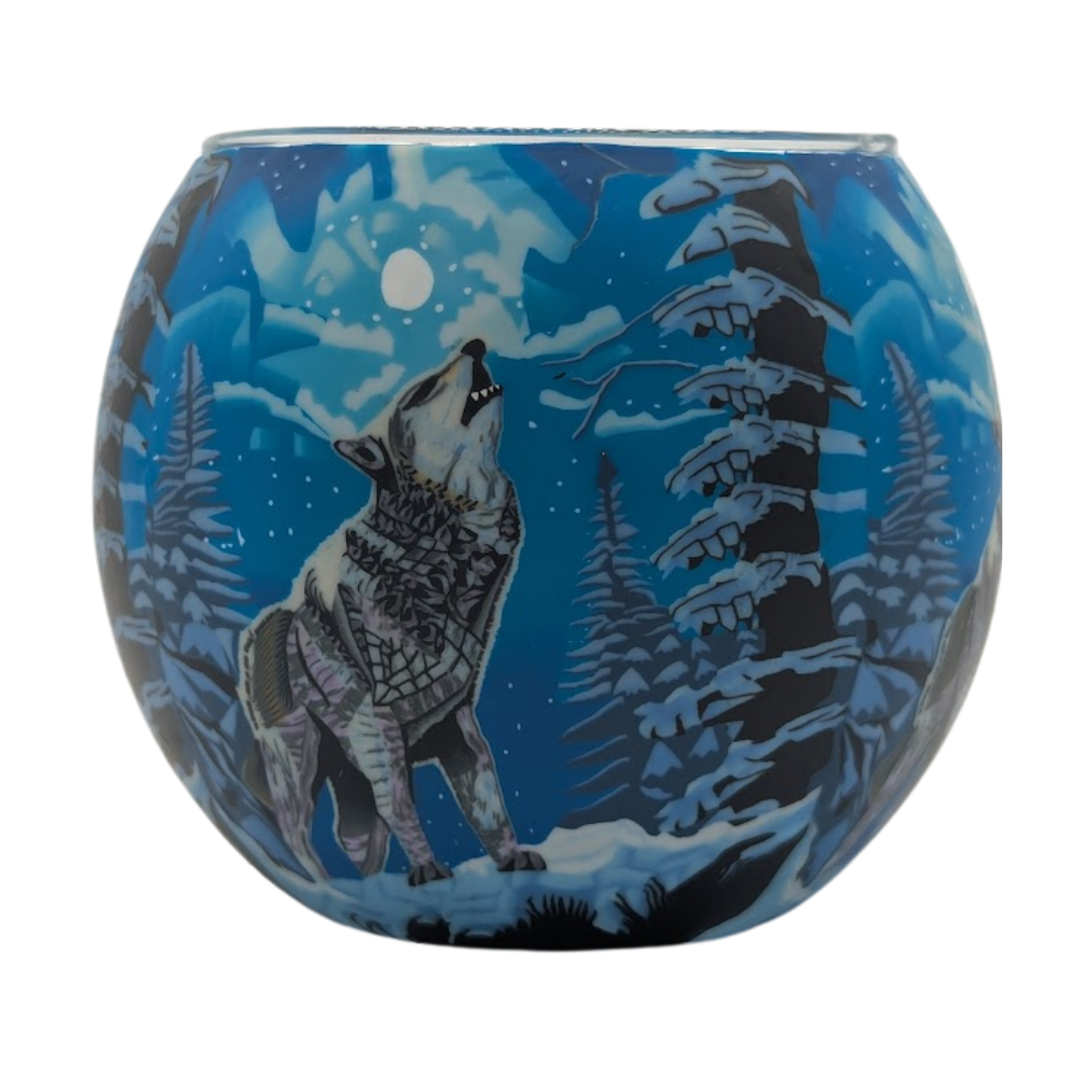 Claymaster Howling Wolf light globe with a grey wolf howling at a full moon among snowy evergreens in deep blue tones