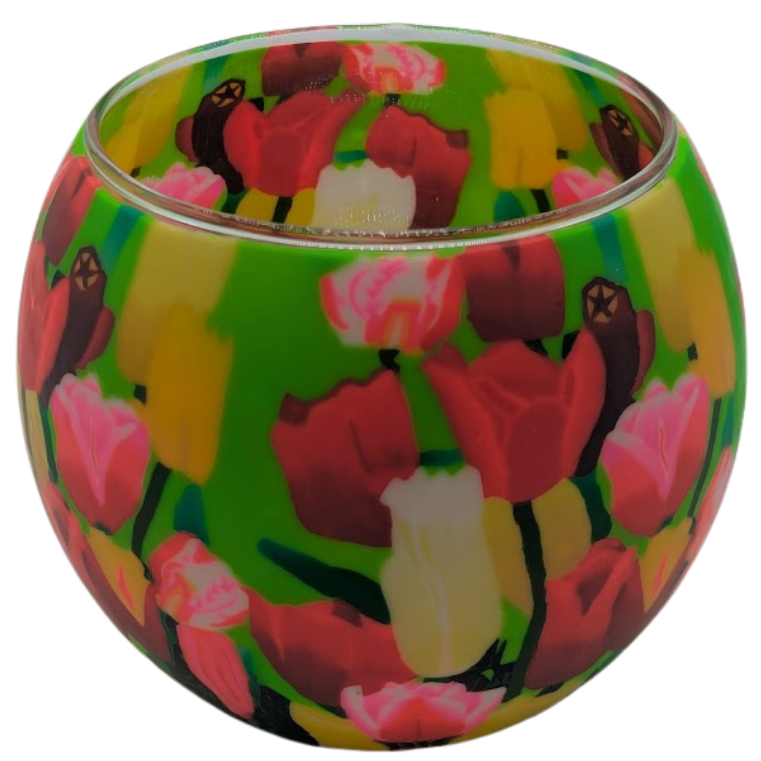 Colorful glass globe with floral pattern on a white background