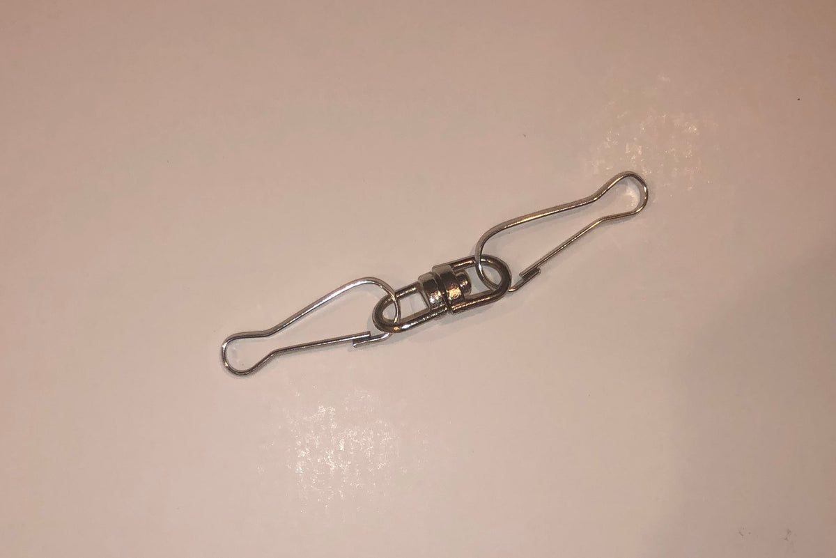 Stainless steel barrel swivel with wire clip hooks on each end, a hanging hardware accessory for wind spinners